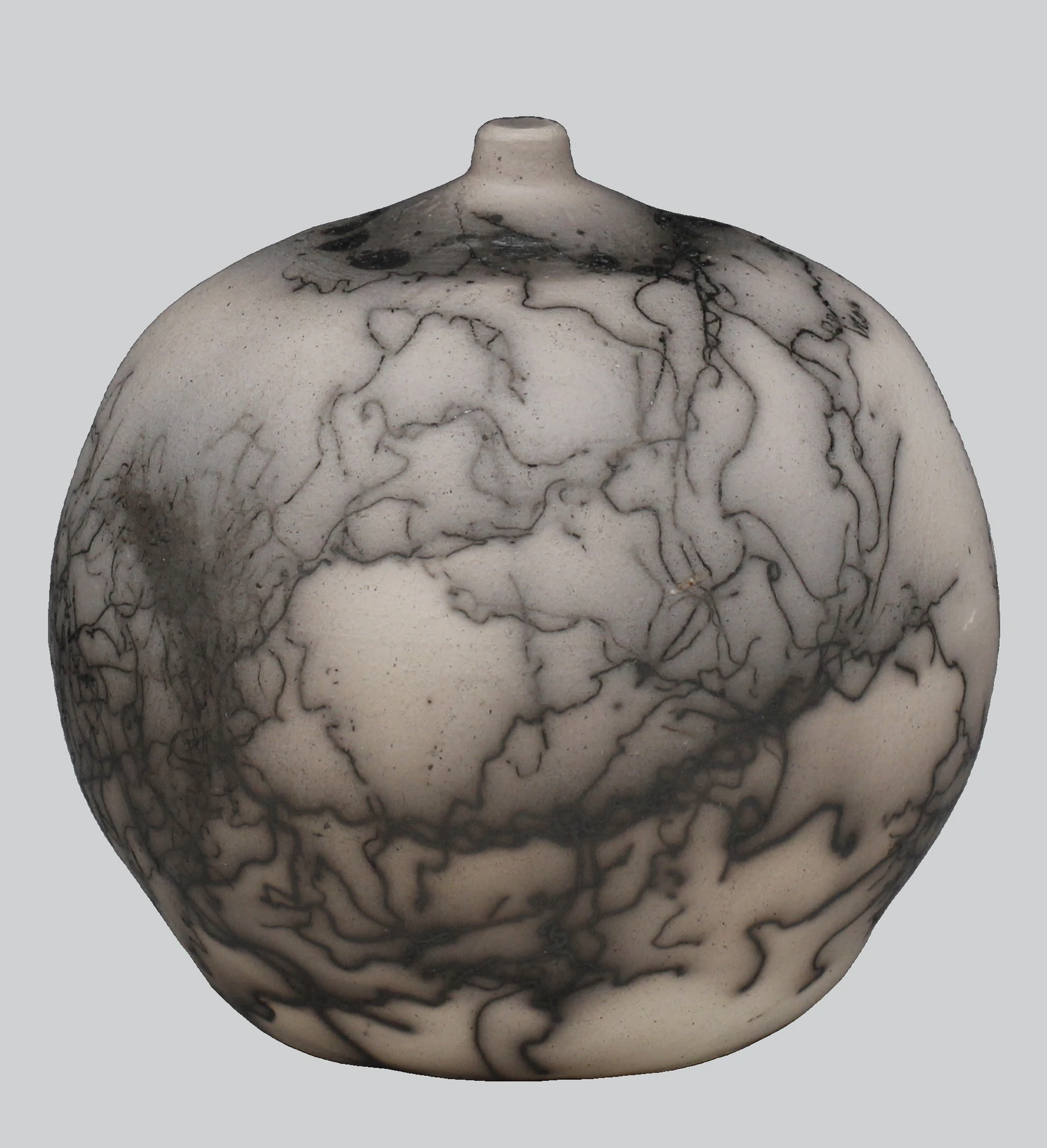 Aching breast — a bottle, horsehair raku